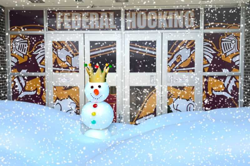 FedHock front door covered with snow. A King Snowman is in front.